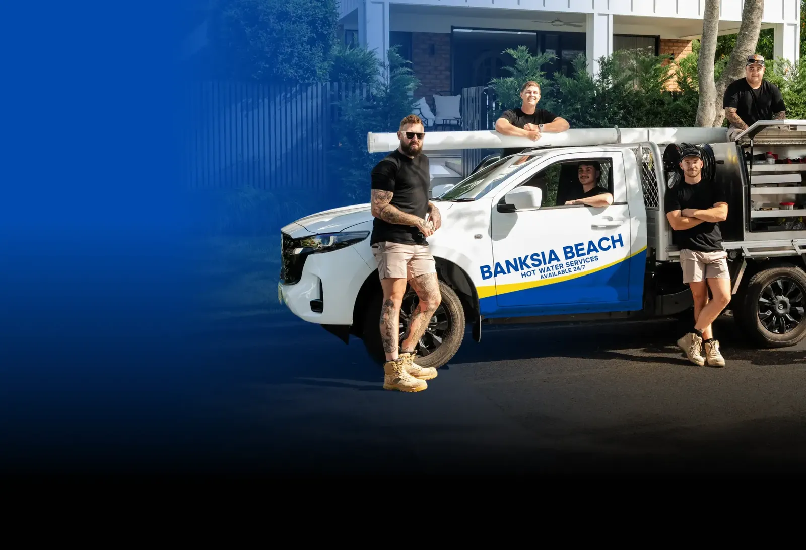 Banksia Beach Hot Water Services team with the ute